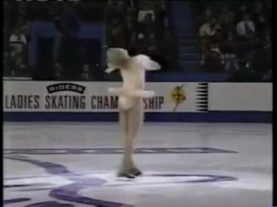 Denise Biellmann creator of the Biellmann spin, doing the Biellmann into a headless scratch spin in 1995.