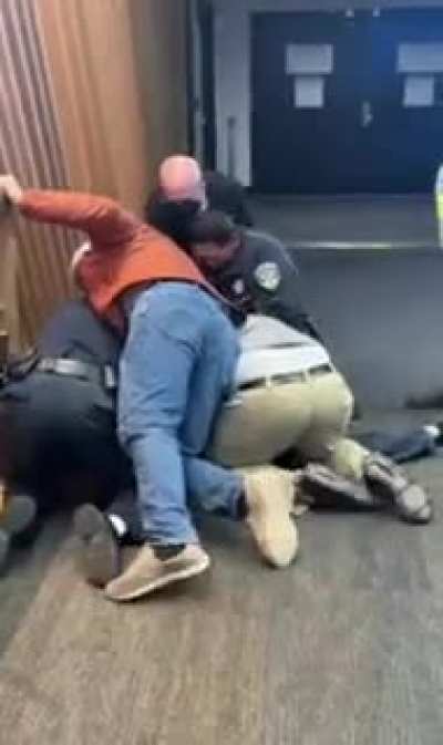 Man has an episode at the gate house of a United flight, goes on a homophobic rant against a flight attendant, hits a cop and then gets jumped!