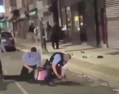 Cops intentionally put man's hand on stick just for an excuse to beat him up.