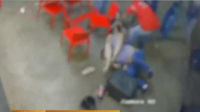Woman dislocates a much bigger man's arm with an armbar in a street fight (Brazil)
