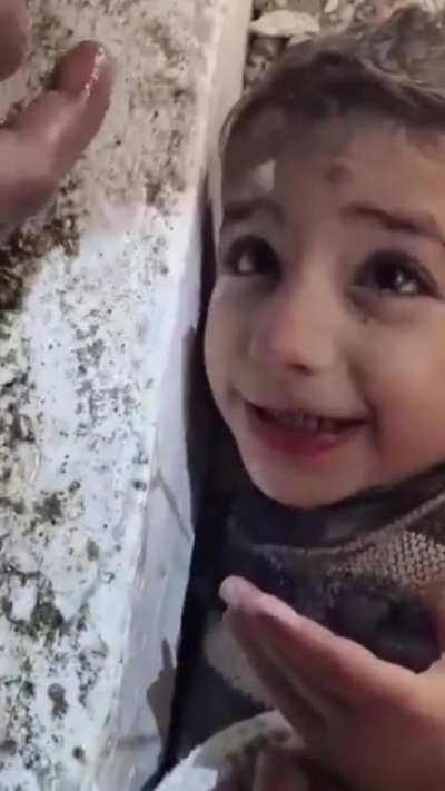After 44 hours of devastating earthquake in Turkey, a team of heroes successfully rescued 2-year-old 'Muhammet'. The rescuers provided the dehydrated child with water.