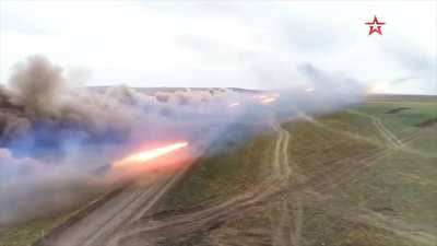 TOS-1A 24-barrel thermobaric multiple rocket launchers in action