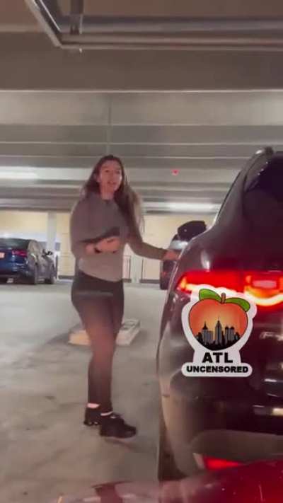 Lady forgets her key to enter the apartment's covered parking space. Meets her first 