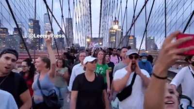Protesters against mandatory vaccinations chant 