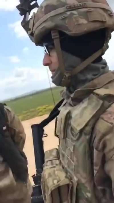 soldiers ask syrian locals if they know mia khalifa
