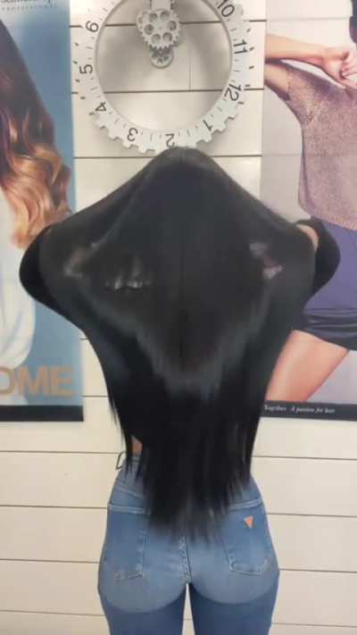 Mădălina Mateș showing off her long, straight black hair.