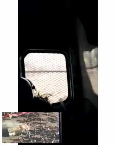 Footage inside a riot police transport while being attacked by rioters