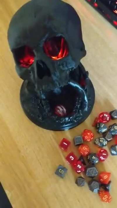 I 3D printed this skull dice tower and integrated some red LEDs into the print as my gift for my secret santa! Rather pleased with the result!