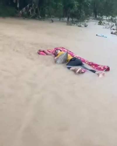 This mf really be sleeping in a middle of a flood