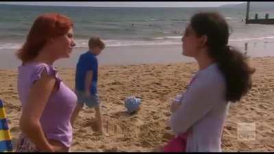 Kids burying their dad In the sand