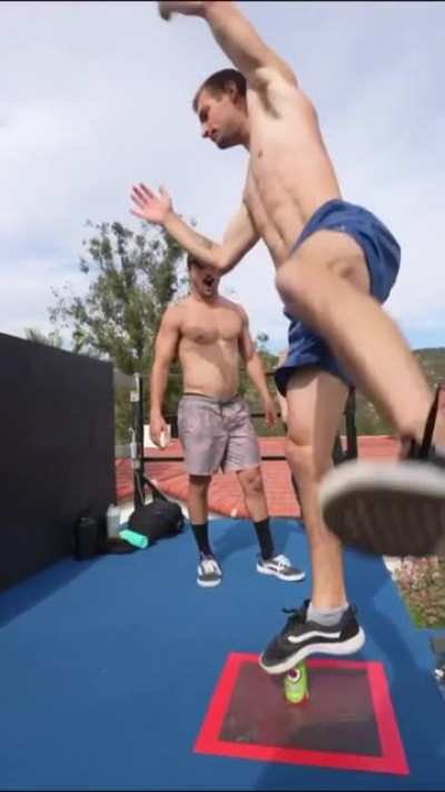 Man manages to balance even after getting flung from the trampoline