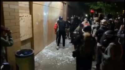 (Anti)fa Militants Harass Elderly BLM protestor in Portland, covering her in paint after she tries to put out a fire they started