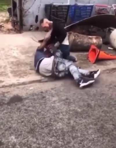 Man grabs a shovel and beats the hell out of 2 guys fighting