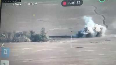 A hit on a Russian armored personnel vehicle sends a crew member into the air