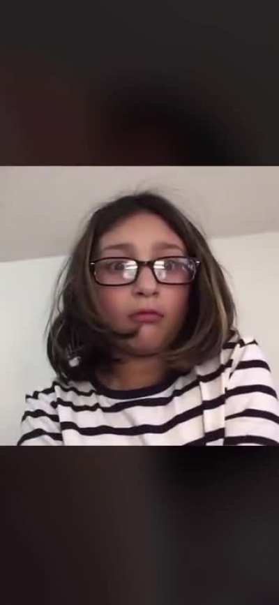 the reaction of this girl who drops her phone on her ipad is priceless