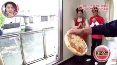 Man throws pizza into microwave in neighboring home