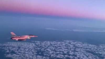 Polish F-16 from 31st Tactical Air Base in Poznań-Krzesiny going full afterburner during a stunning sunset.