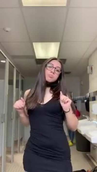 teen shaking ass in school bathroom