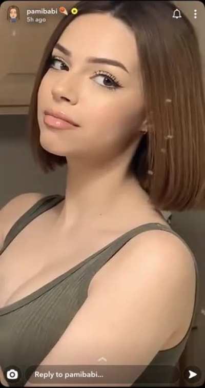 Beautiful and that cleavage wow!!