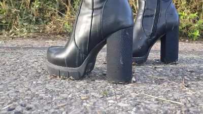 Snails crushed with platform boots