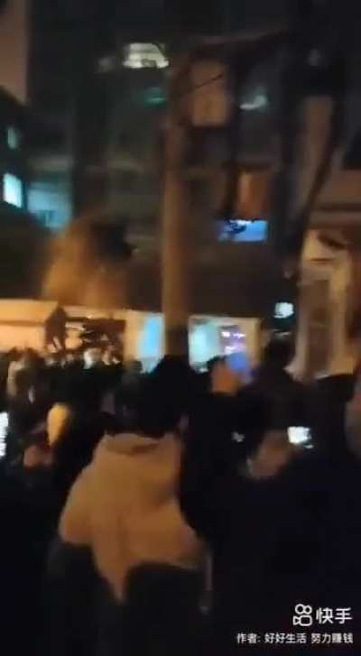 Protestors in Xinjiang China chanting to end Covid Lockdown