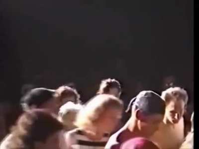 Axle rose jumps into crowd and attacks fan for recording the concert