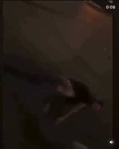 Guy slides face first across parking lot after getting too close to truck doing donuts