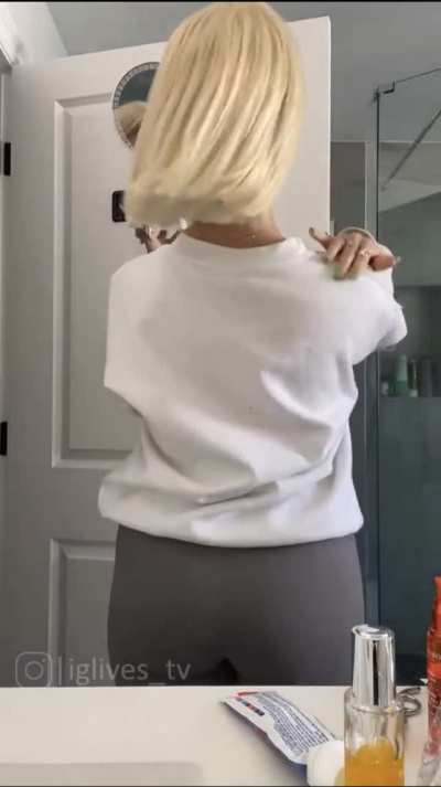 “Fixing her hair”