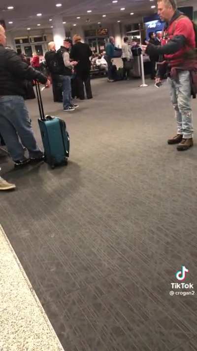 Airport meltdown with a Radiohead reference.