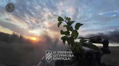 Footage of a Ukrainian tank attack by the 3rd Assault Brigade on a Russian position. Kharkiv Oblast. 