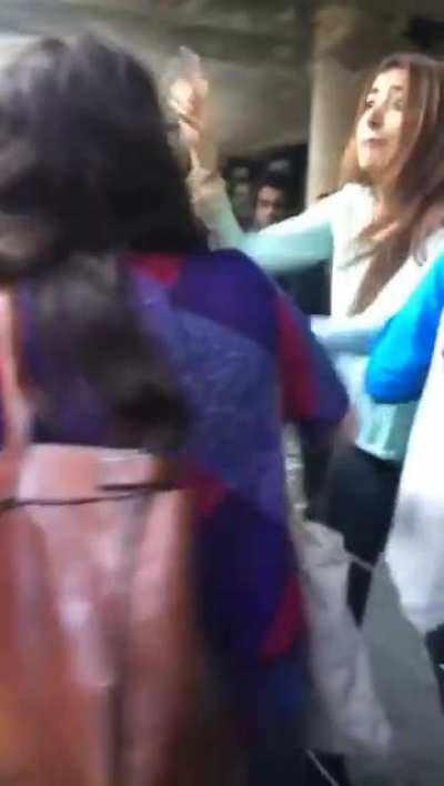 A girl cuts the line and insults a boy's girlfriend, she didn't see it coming.