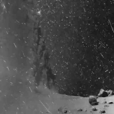 Dust, stars, and cosmic rays swirling around Comet 67P/Churyumov–Gerasimenko, captured by the Rosetta probe.