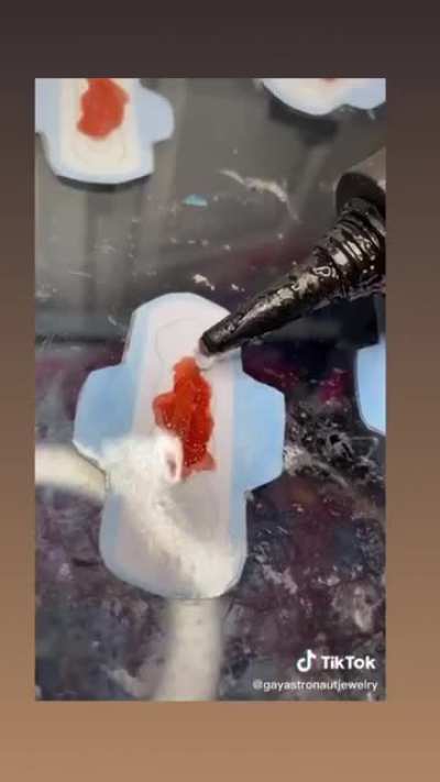 Bloody menstrual pad earrings