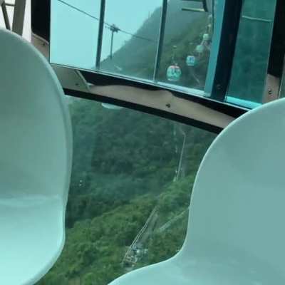 when your friends are on a cable car and they have a fear of heights