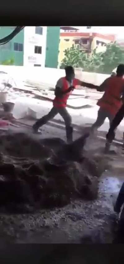 Getting hit by your work mate with a shovel