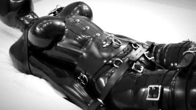 Bound in a latex catsuit