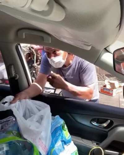 She's Got Heart: Homeless Dude Acting Racist as He's Being Served Free Food