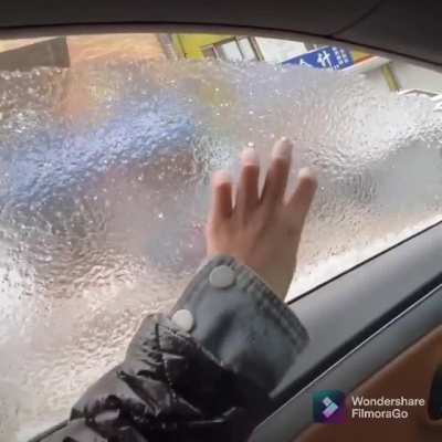 Pushing ice off the car window