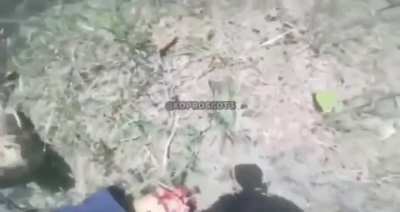 Russian soldier picks up an enemy grenade and blows his hand off