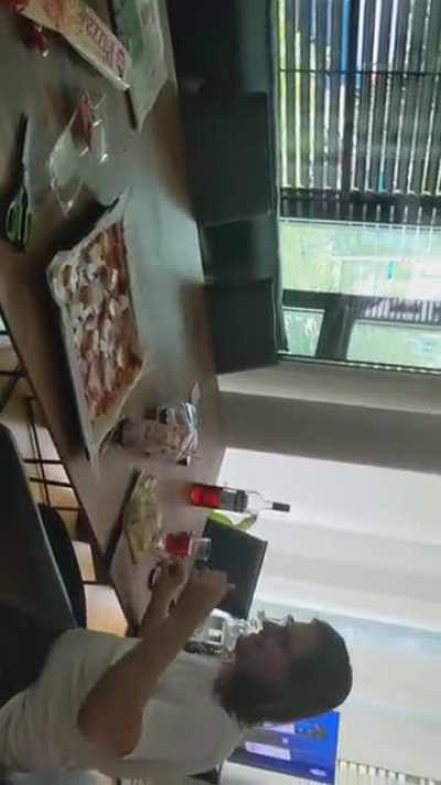 decorating pizza