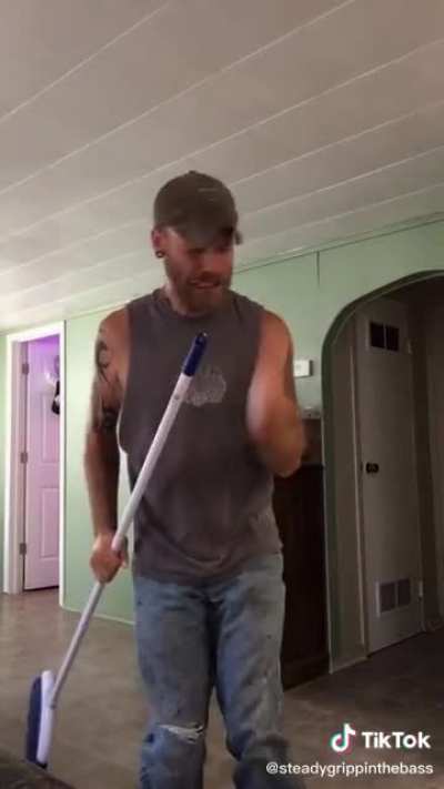 Working that broom to country music