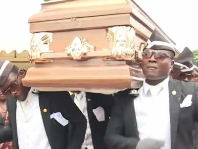 coffin guys drop person in coffin