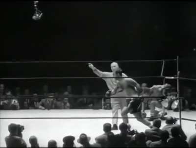 Dropped and trailing on all cards, Rocky Marciano turns Jersey Joe Walcott's face to mush with his famous Suzy Q punch in the 13th round. September 23, 1952.