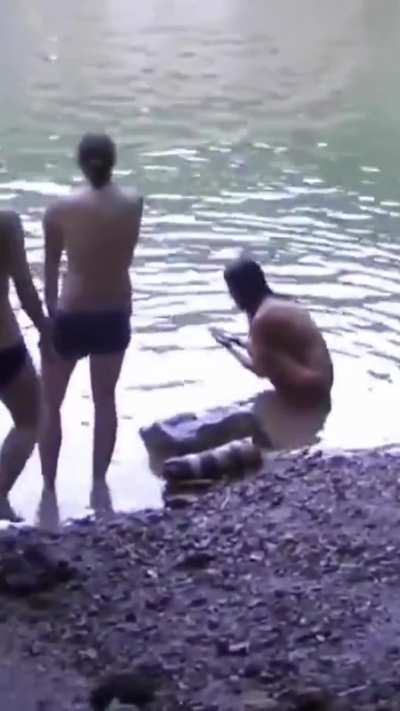 A cute, petite Asian woman hikes the mountains completely naked. Tourists don't bother her. She swims in the river, climbs trees, and walks along trails.