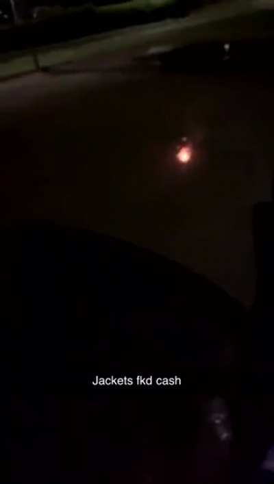 Playing with fireworks on the road.