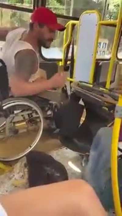 Two people in wheelchair arguing