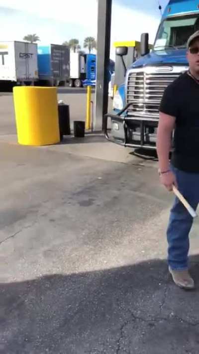 Trucker Tries To Intimidate Another Trucker With A Tire Thumper And Lets Everyone Know He's American