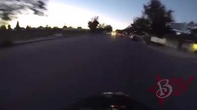 Idiot puts a sticker on a cop car, flees, and gets instant karma