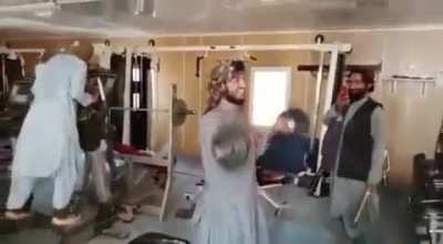 The Taliban “working out” inside the gym of the Presidential Palace