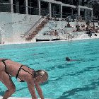 CrossFit girl hanging by the pool.